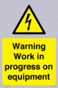 warning-work-in-progress-on-equipmentwith-electrical-hazard-symbol~